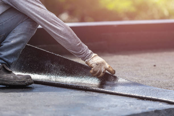 Professional Waterproofing technician working in Davison, MI